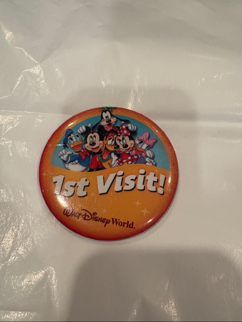 Disney Orange "1st Visit!" Character Button Badge